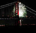 green_fireworks_behind_bridge.jpg (252214 bytes)